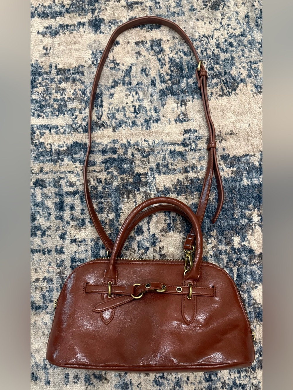 Brown leather dome satchel handbag,